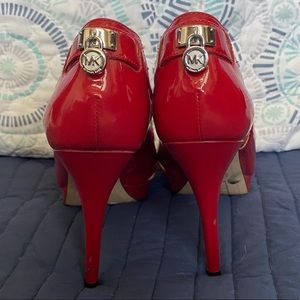 Michael Kors patent red peep toe pump!